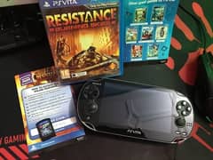 PS Vita for sale 10/10 condition with 2 free games and box included