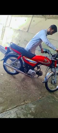 the 2014 model Honda 70 and registration is 2016 full good condition