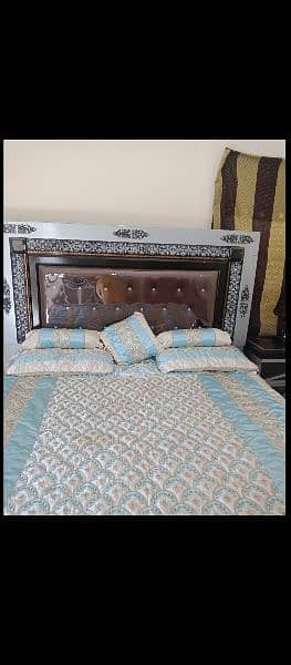 Double bed with 2 side tables with dressing + save almari three door 0