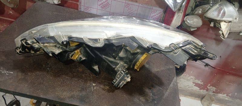 vitz 2021.2022 head light right side 4