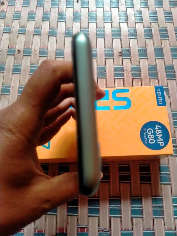 tecno spark 7 pro set and box no charger ok set he need cash 9