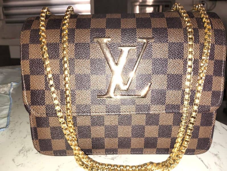 three LV cross body bags 0