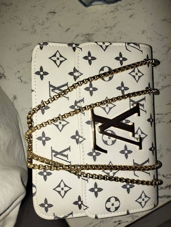 three LV cross body bags 2