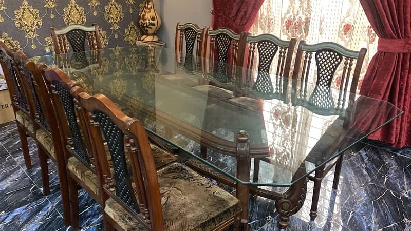 10 seater dining table, glass top and wooden chairs 3