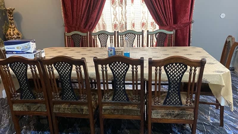 10 seater dining table, glass top and wooden chairs 4