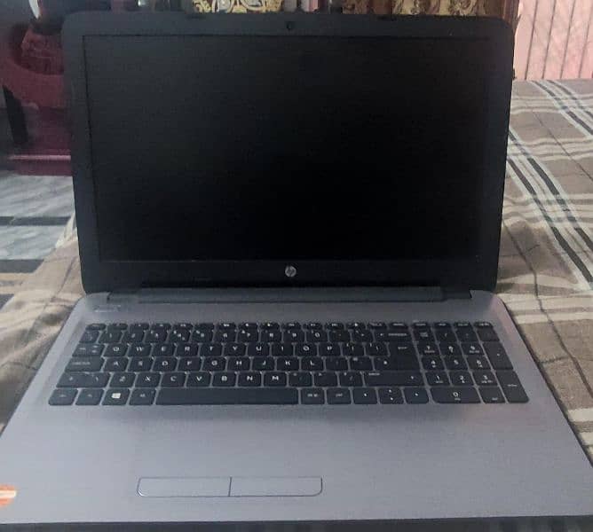 Khalid laptop HP I-3 4rth generation 0