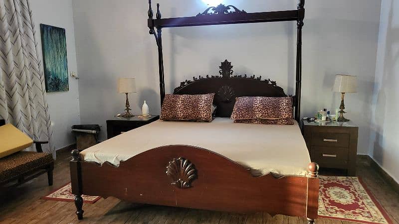 antique bed along with side table 0