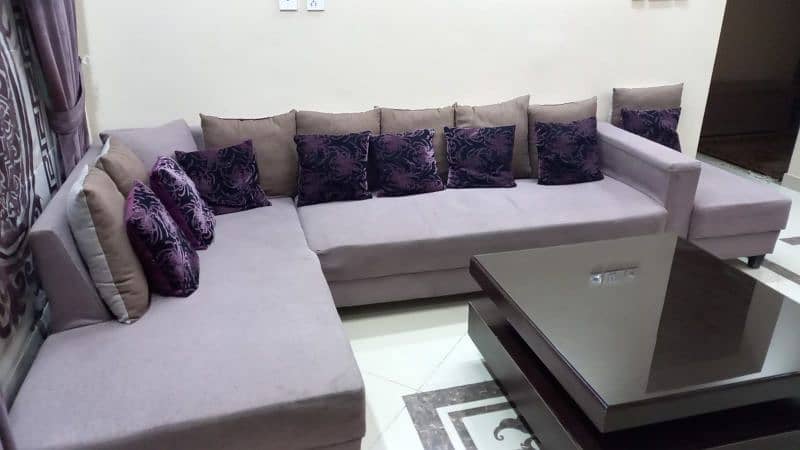 L shaped sofa and center table with 2 side tables 0