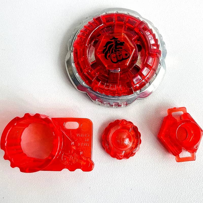 Beyblade metal Leone bey/accessories 0