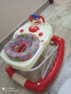 Baby walker with rocking function