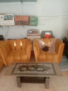 yellow colour sofa 3peses and 1tibal