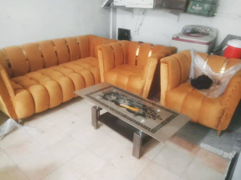 yellow colour sofa 3peses and 1tibal 3