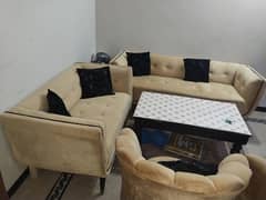 Sofa with Two Coffee chairs and Table