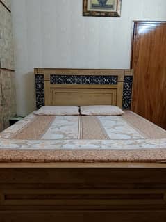 Wooden medium size bed