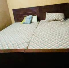 2 Single beds with mattress