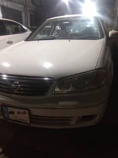 Nissan Sunny 2010 model withe color Islamabad register