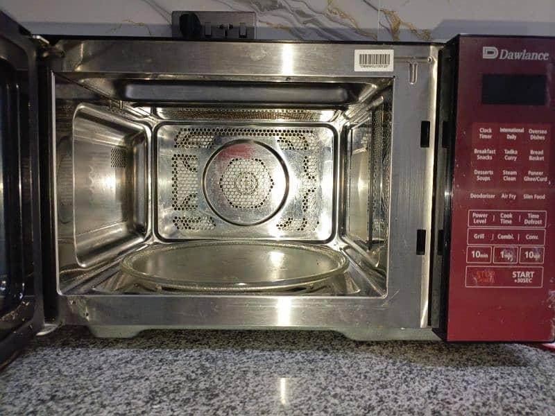 half a year used Dawlance oven. . . just like new 1