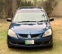 Mitsubishi Lancer GLX 2005, excellent condition.