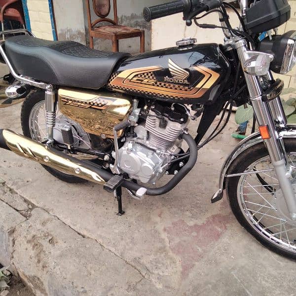 golden special edition bike just 121 km 0