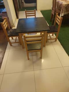 kids table with 4 chairs in wood very good and solid condition