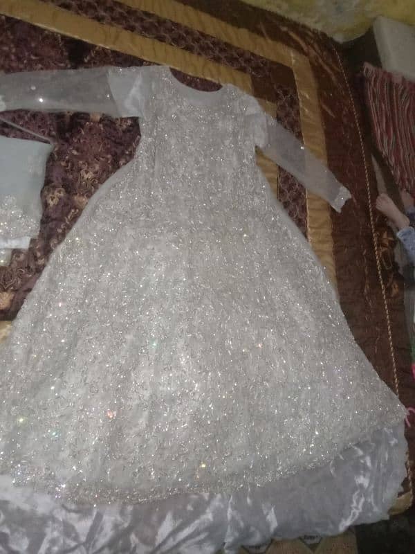 walima maxi hand made off white with excellent condition with longtale 1