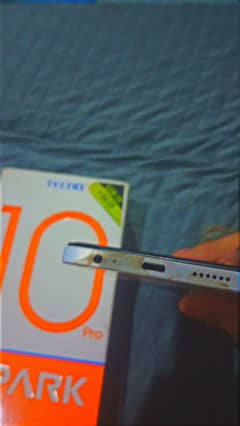 tecno spark 10 pro with original charger with boks 10 10 condition