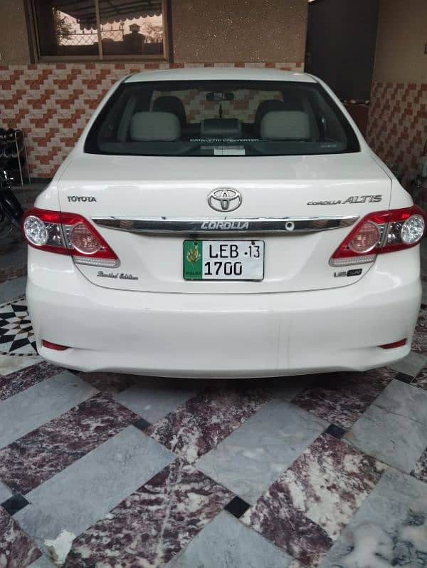 Toyota Altis 1.6 2013  car for sale 10 by 10 condition punjab number 0