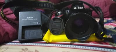 D3200 Nikon With 50mm low light lense original for sale urgently