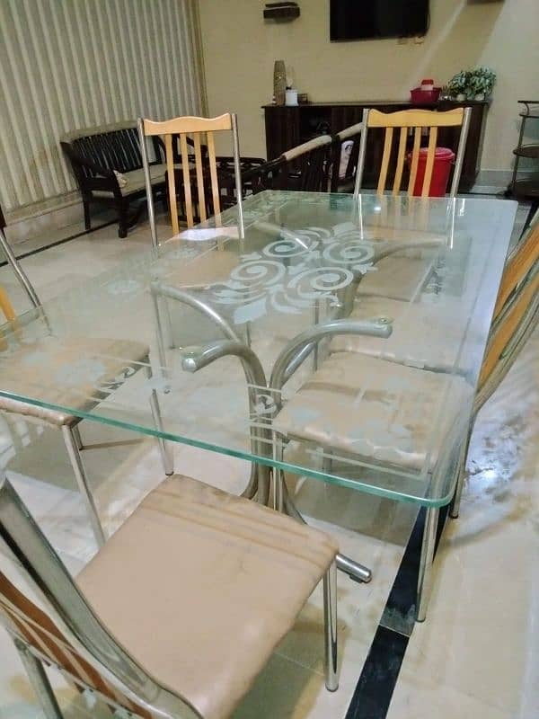 6 seater steel dinning table 0