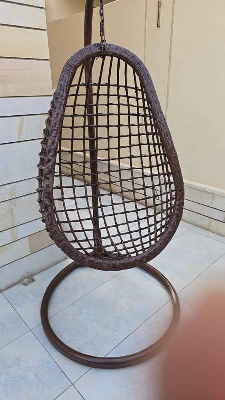 swing chair Jhoola with iron stand & cushion. . . 1