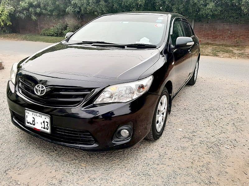 Corolla XLI 2014 converted GIi 1.3 CC Manual Gear, Lahore number. 4