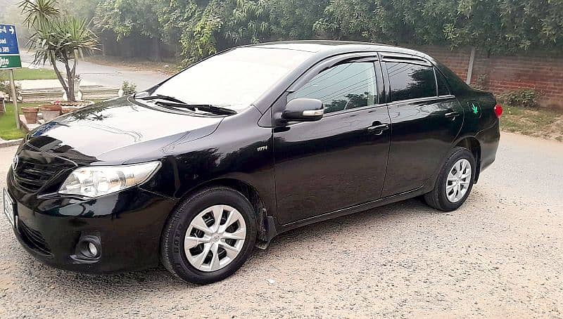 Corolla XLI 2014 converted GIi 1.3 CC Manual Gear, Lahore number. 5