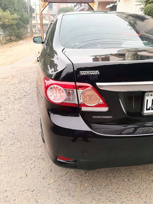 Corolla XLI 2014 converted GIi 1.3 CC Manual Gear, Lahore number. 6