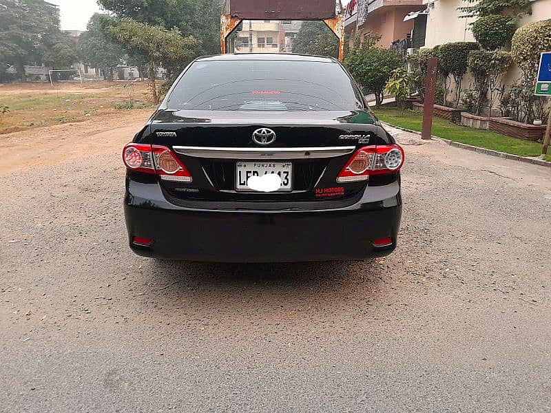 Corolla XLI 2014 converted GIi 1.3 CC Manual Gear, Lahore number. 0