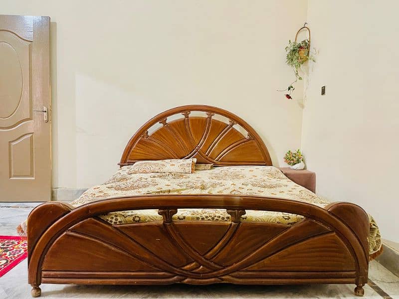 Double used good condition wooden bed for sale 1