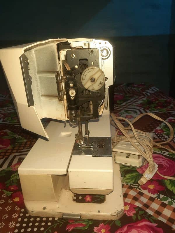 Overlock and Computerized Karhai and shalwar Paichy Krhai machine 2