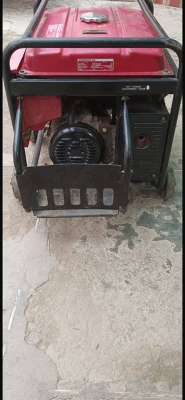 Honda Generator 6500 v red color. 3