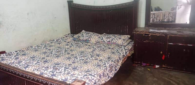 Double bed. dressing. showcase used  for urgent sale 0