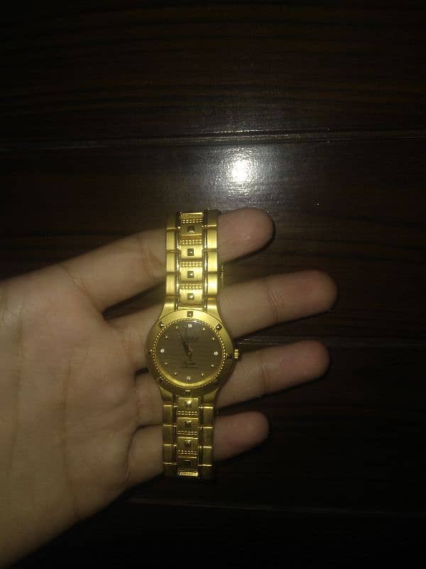 Omax Quartz model HB251 golden 0