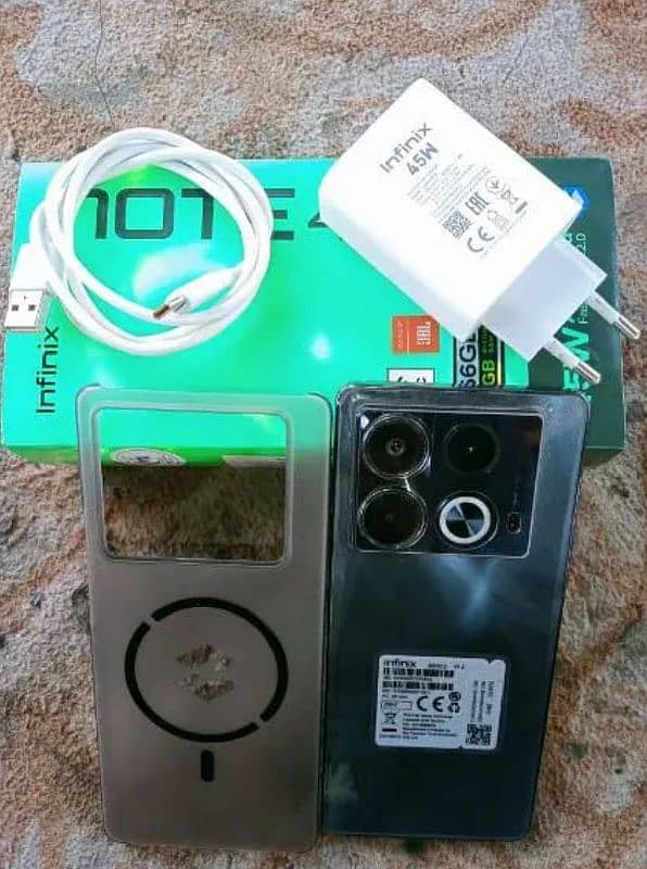 Infinix note 40. one month use only. 8+8/256. all accessories box. 1