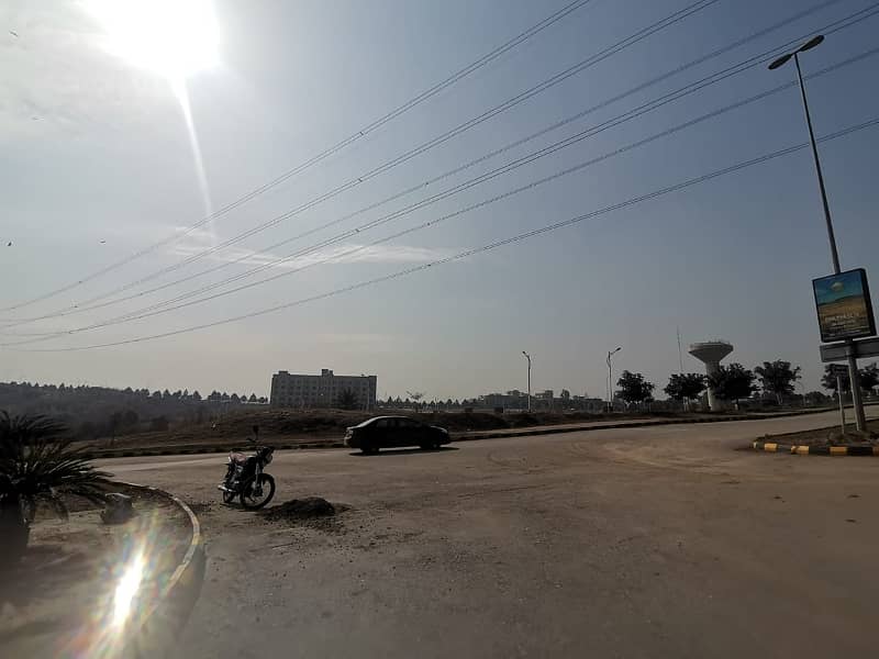 One Kanal Ideal Location Plot For Sale In Sector C ,Street # 02,In DHA Phase 05 , Islamabad 24