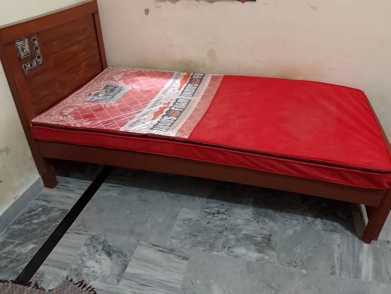 wooden single bed along with mattress 1