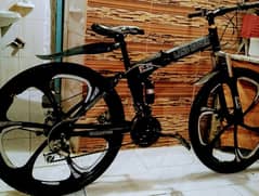 bicycle folding 26 inch brand new 5 month used dual suspension