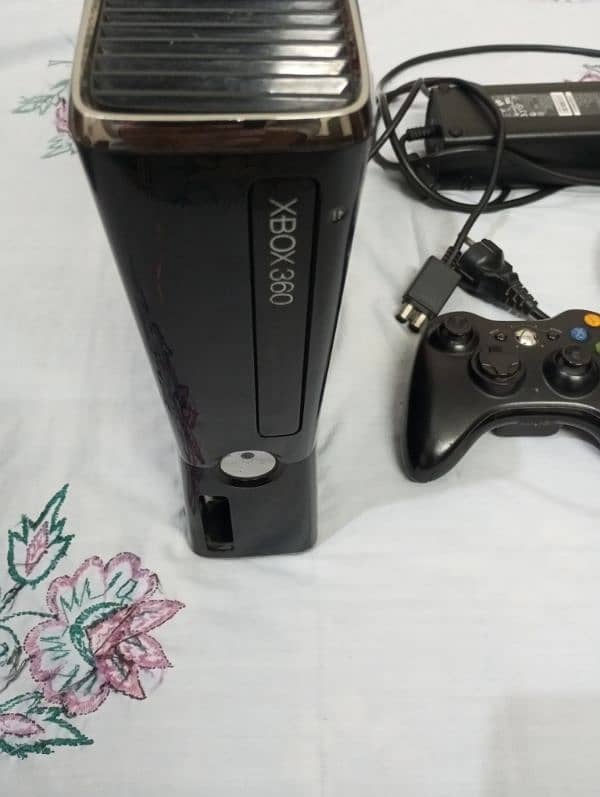 Xbox 360 Slim 0