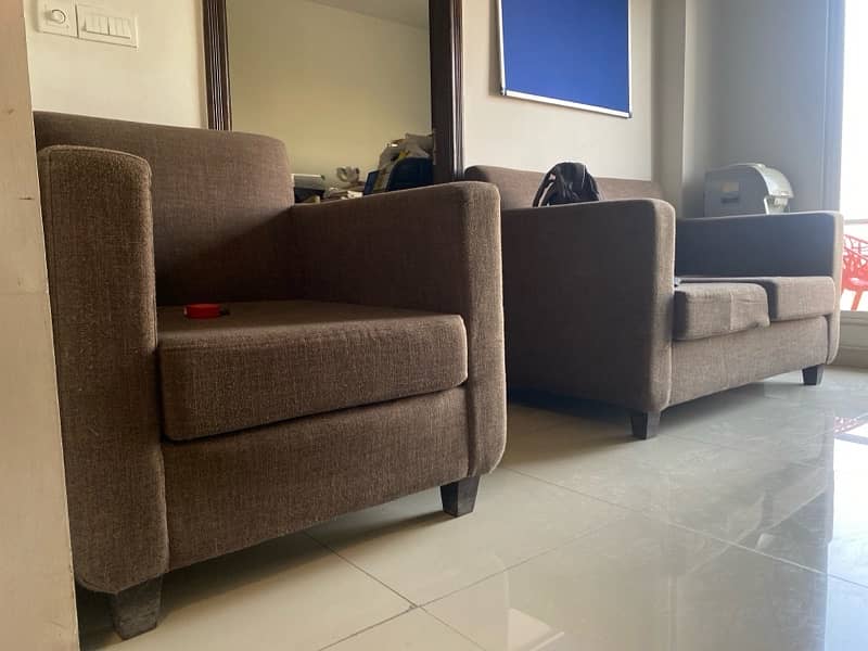 2-seater sofa and two 1-seater for sale, perfect for living rooms. 0