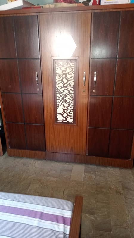 3 door cupboard with a very spacious also have a looker 0