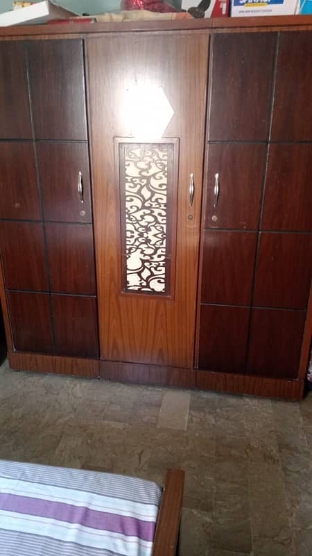 3 door cupboard with a very spacious also have a looker 1