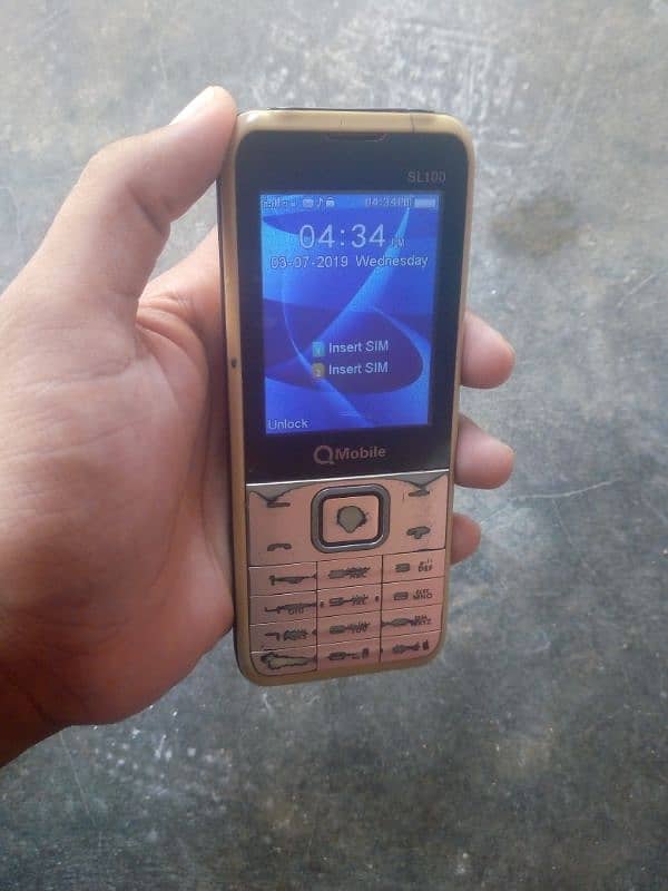 Q MOBILE DUAL SIME Sl100 2