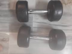 pair of used 4 kg dumbbells