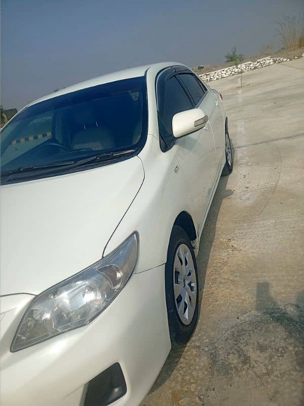 Toyota Corolla XLI 2011 better then civic  city roox mira kia  picanto 14